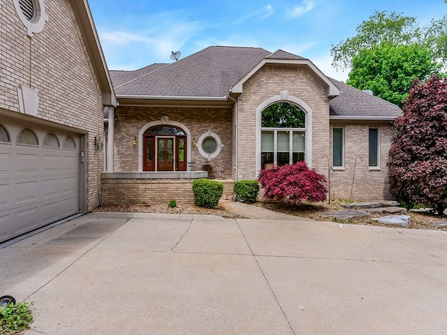 view of front of home with a garage