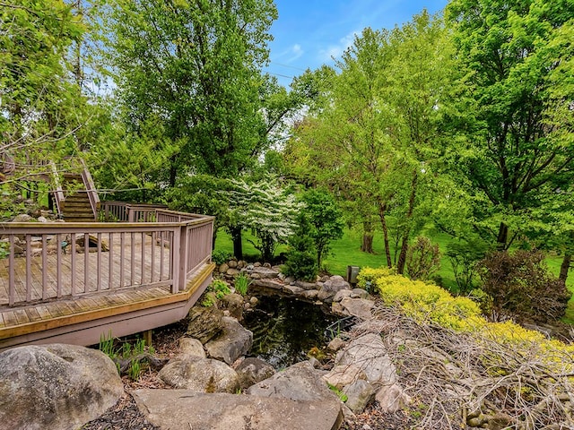 surrounding community featuring a deck