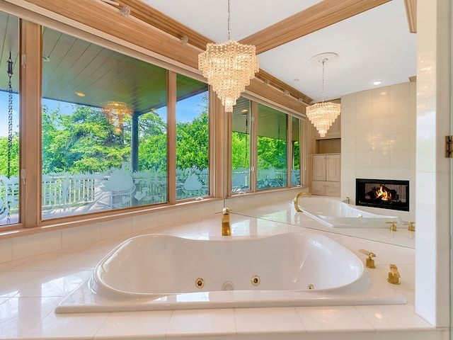 bathroom with a fireplace and a relaxing tiled tub