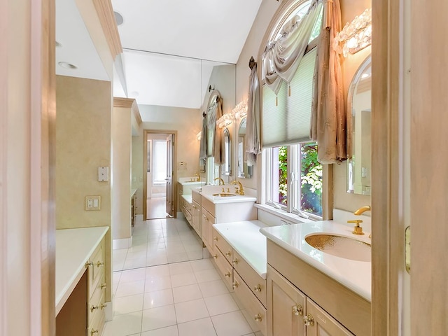 bathroom featuring tile patterned flooring and vanity