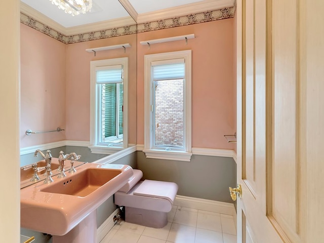 bathroom with sink and tile patterned flooring