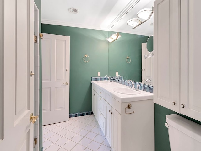 bathroom featuring tile patterned flooring, vanity, and toilet