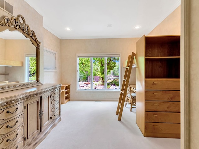 bedroom featuring light colored carpet and crown molding