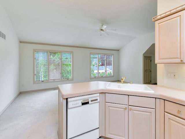 kitchen featuring white dishwasher, ceiling fan, sink, and vaulted ceiling