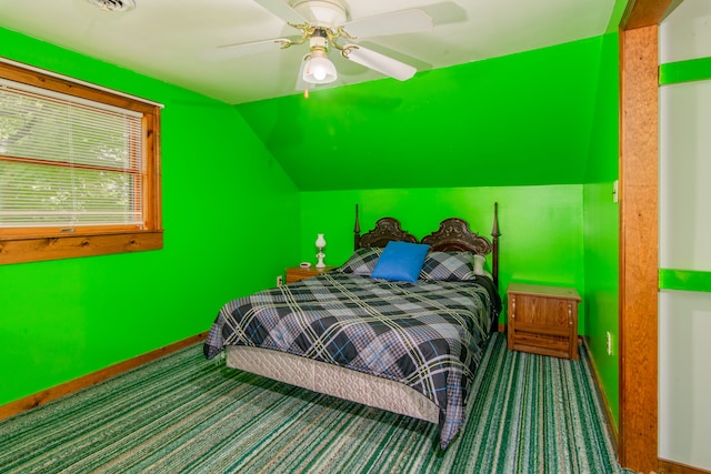 carpeted bedroom featuring ceiling fan and lofted ceiling