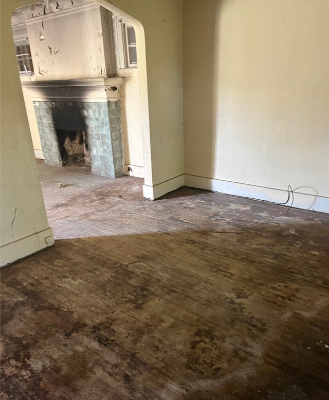 unfurnished living room with a fireplace