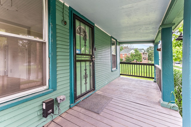 wooden deck with a porch