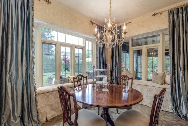 dining room with a chandelier