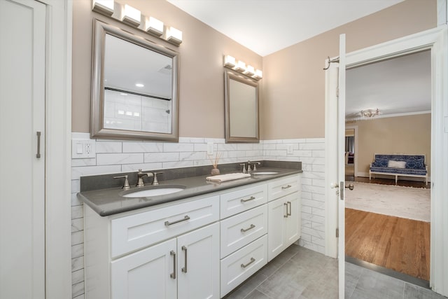 bathroom featuring vanity and hardwood / wood-style flooring