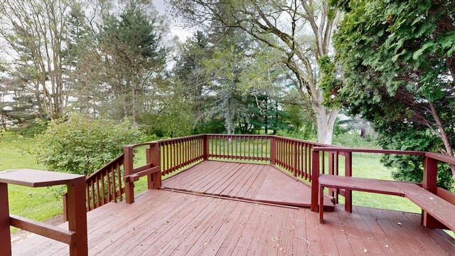 7200 E Tomah Rd, Mount Pleasant, MI 48858 - wooden deck featuring view of scattered trees
