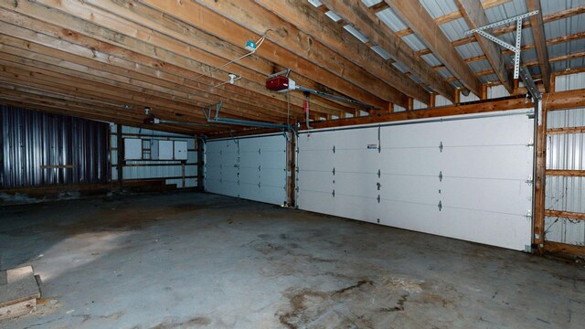 7200 E Tomah Rd, Mount Pleasant, MI 48858 - garage featuring a garage door opener