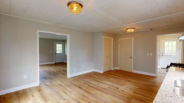 7200 E Tomah Rd, Mount Pleasant, MI 48858 - unfurnished room with light wood-style flooring and baseboards
