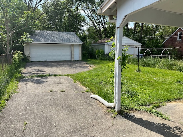 garage with a lawn