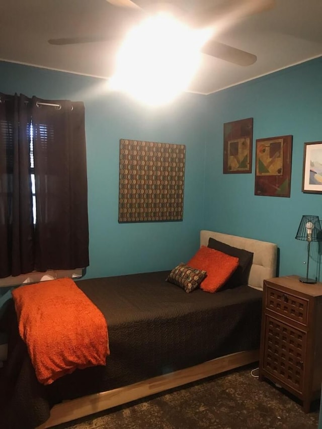 bedroom featuring ceiling fan