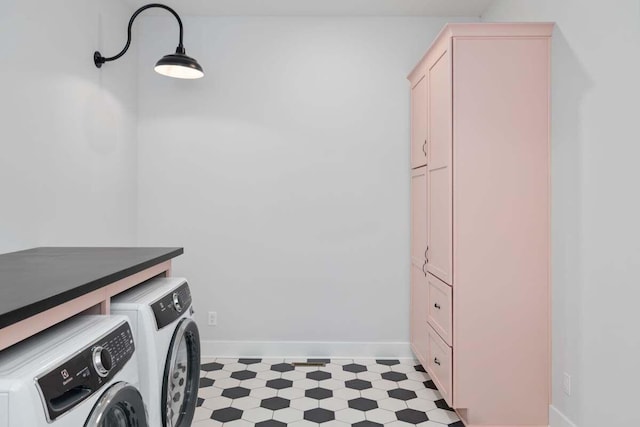 21140 Chubb Rd, Northville, MI 48167 - laundry room featuring cabinet space, separate washer and dryer, baseboards, and light flooring