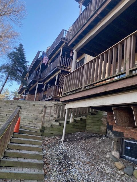 view of home's exterior with central AC unit