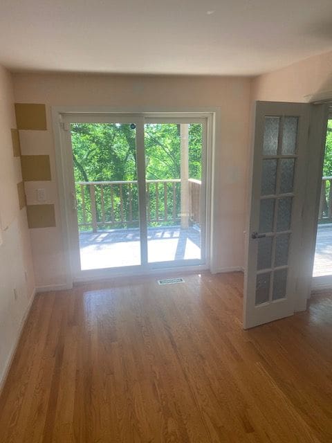 doorway to outside featuring hardwood / wood-style floors