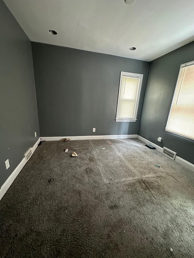 view of carpeted spare room