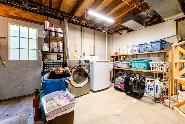 washroom featuring washer and dryer