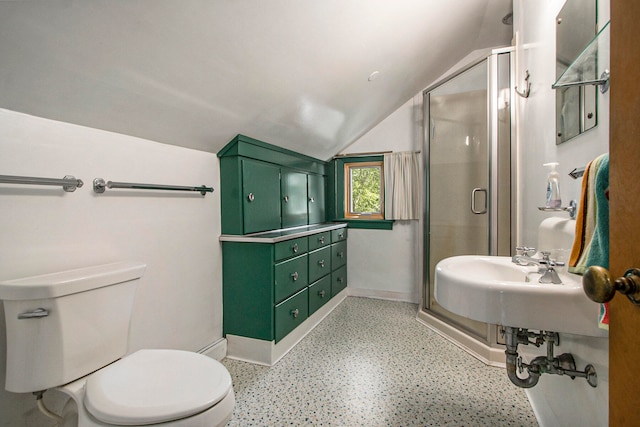 bathroom featuring toilet, a shower with door, lofted ceiling, and sink