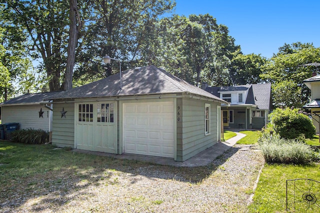 garage with a yard