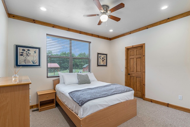 carpeted bedroom with ceiling fan