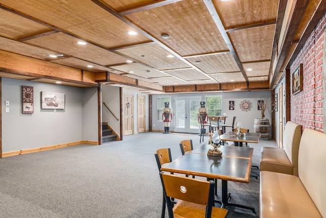 carpeted dining area with french doors and wooden ceiling