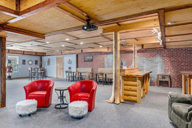 living room featuring carpet and brick wall