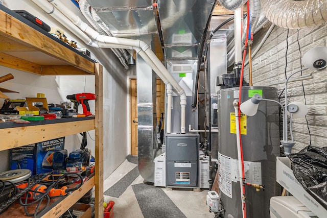 utility room featuring gas water heater