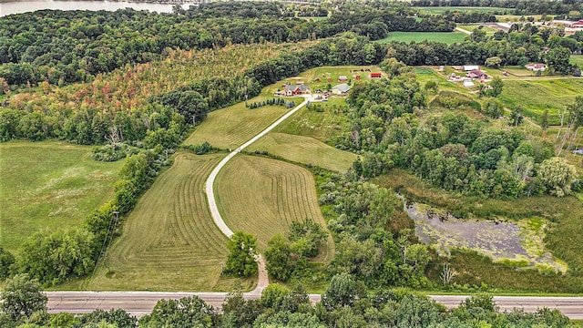 birds eye view of property featuring a rural view