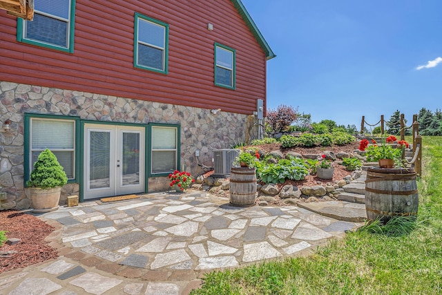 view of patio / terrace featuring central air condition unit and french doors