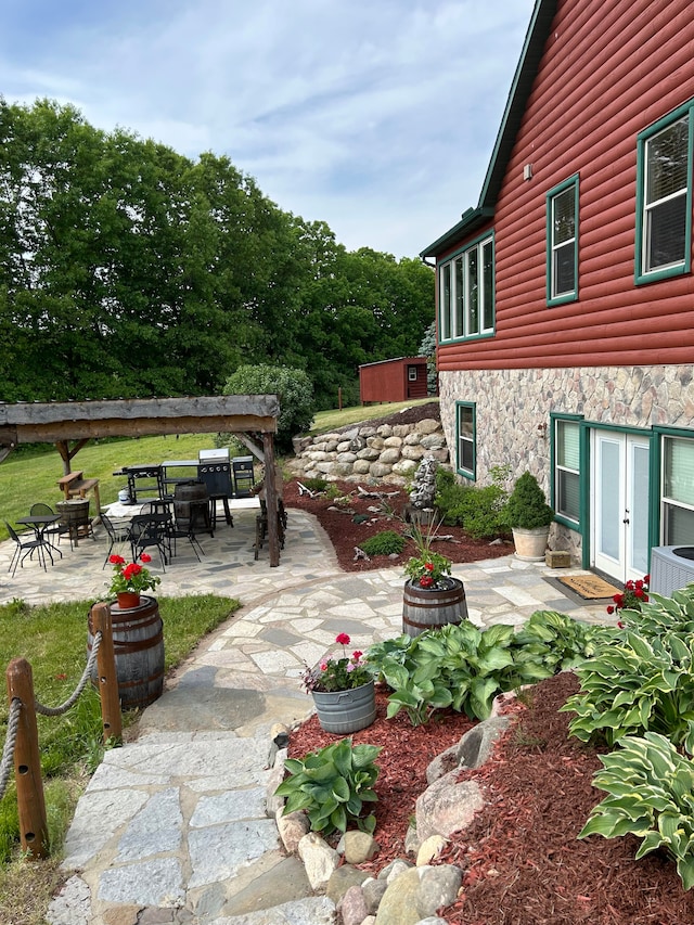 view of patio / terrace featuring french doors