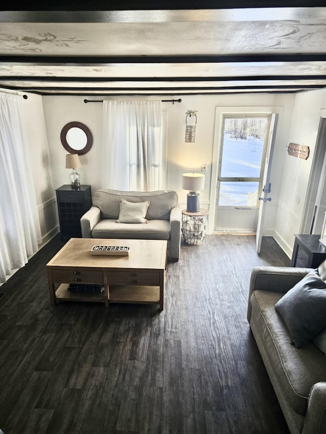 living room with baseboards and dark wood finished floors