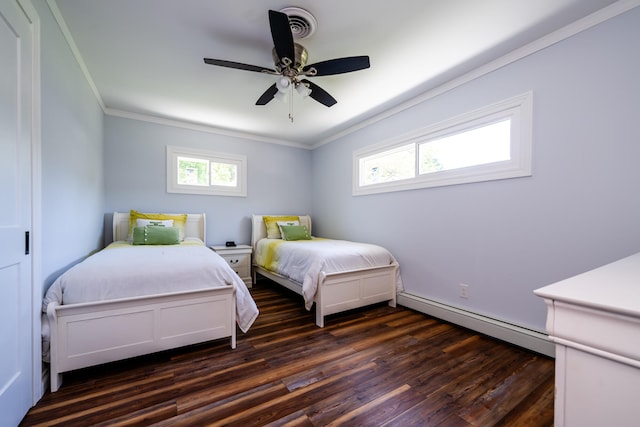 bedroom with dark wood-type flooring, multiple windows, a baseboard heating unit, and ceiling fan