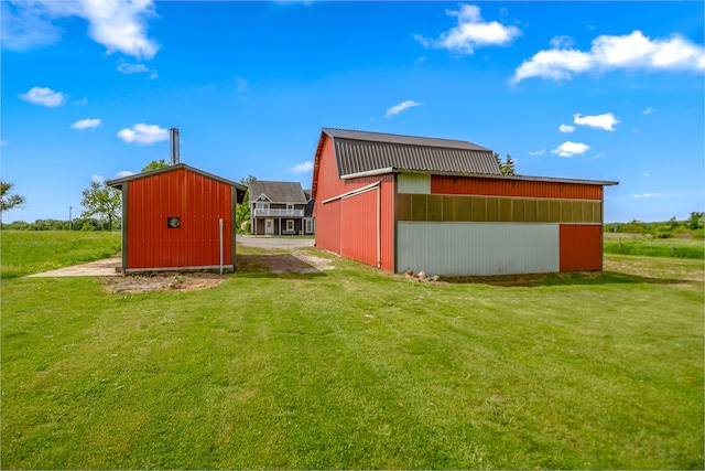 exterior space with an outbuilding