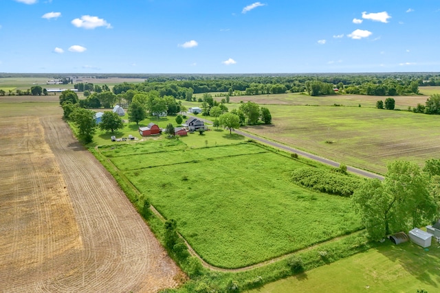 birds eye view of property featuring a rural view