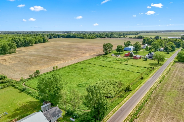 birds eye view of property featuring a rural view