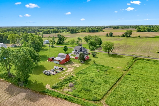 birds eye view of property featuring a rural view