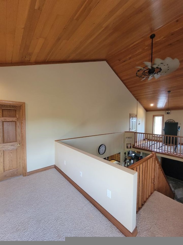 kitchen with carpet, lofted ceiling, ceiling fan, and wooden ceiling