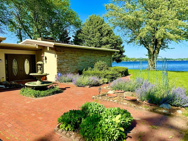 7206 Beechwood Cir, Watervliet, MI 49098 - view of patio featuring a water view