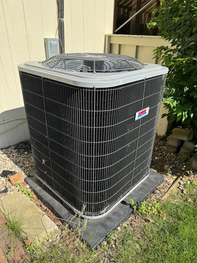 exterior details featuring cooling unit