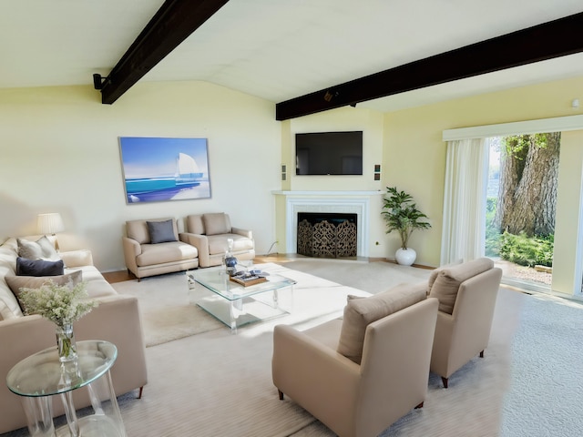 carpeted living room featuring lofted ceiling with beams