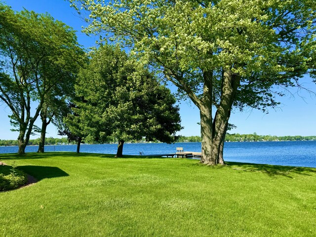 7206 Beechwood Cir, Watervliet, MI 49098 - view of green lawn featuring a water view