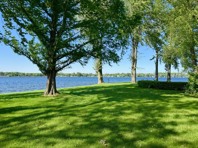 7206 Beechwood Cir, Watervliet, MI 49098 - view of green lawn featuring a water view