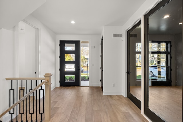 foyer entrance featuring light hardwood / wood-style floors