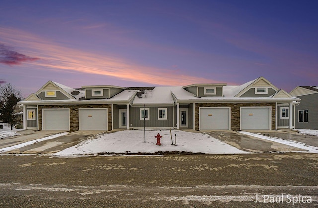 view of front of property with a garage