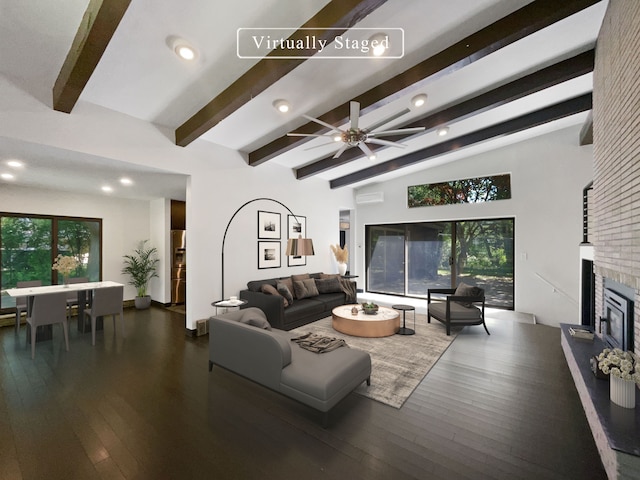 living room with dark hardwood / wood-style flooring, a brick fireplace, plenty of natural light, and ceiling fan