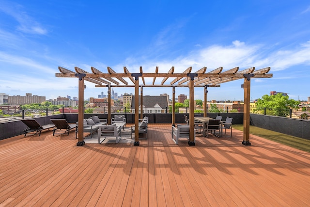 wooden deck with a pergola, a view of city, and outdoor lounge area