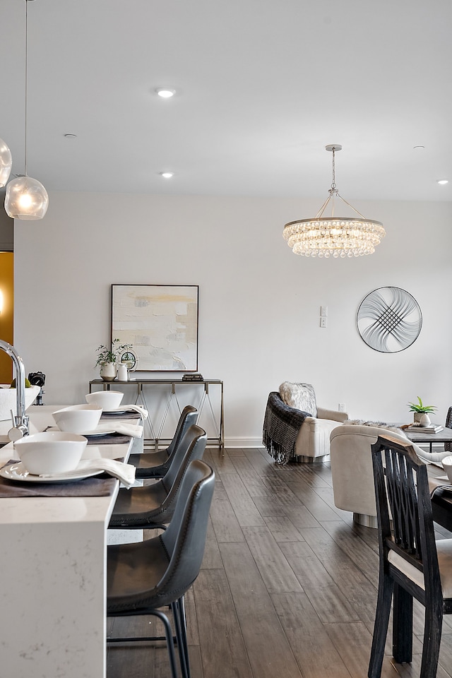 home office featuring baseboards, an inviting chandelier, recessed lighting, and dark wood-style flooring