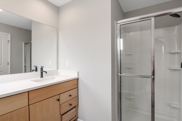 bathroom featuring vanity and walk in shower